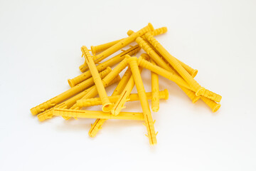 large yellow dowels on a white background