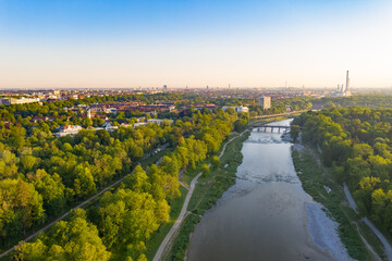 Isar river flowing into Munich city centre from the alps in the morning with mist in the air....