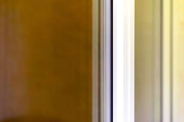 Outside close up glass windows of the office building on sunny day