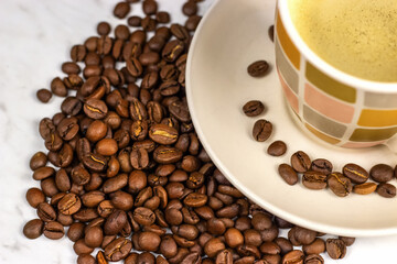 Coffee Cup and coffee beans. Close up