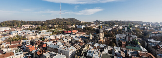 horizontal image of lviv cityscape with dominican church and carmelite church