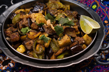 Indian mixed vegetables curry served on stainless steel dish