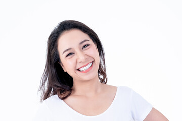 Portrait images of Asian young, pretty woman is 25 years old, She is smiling brightly, She has beautiful white and clean teeth, sparking eyes On white background to people and beauty concept.