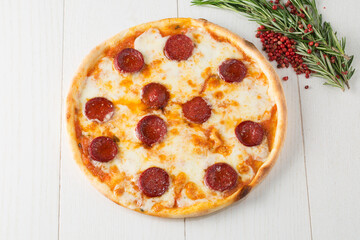 fresh italian classic original pepperoni pizza isolated on white background