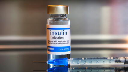 Vial of Insulin injection with a syringe