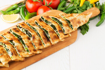 Turkish pizza with spinach and feta cheese
