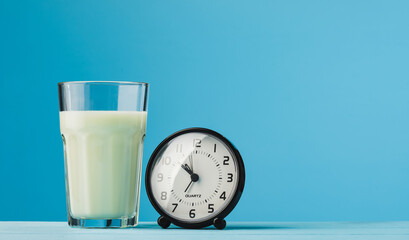 space fruit milk with clock on blue