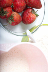 Swiss roll with spinach and mint. Stuffed with strawberries. Ingredients for cooking.