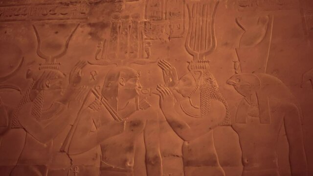 Egypt Temple of Kom ombo engraving pharoah and gods on sandstone wall