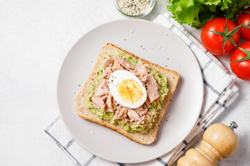 Avocado toast with tuna and boiled egg.