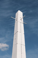 White obelisk in Kazan city on the blue skies background. Concrete monument 