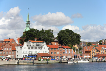 Waterside panorama of Kappeln and  steeple of St. Nikolai church