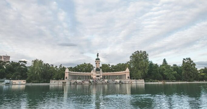 The Retiro Park in Madrid, Spain in 4K time lapse, Alfonso XII monument, in a cloudy day