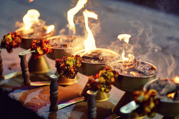Fototapeta na wymiar Aarti ceremony flowers with fire in Varanasi