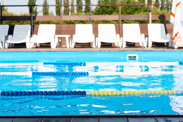 pool with swimming paths, summer sports background.