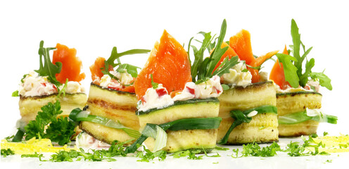 Smoked Salmon Finger Food with Vegetables and Salad isolated on white Background