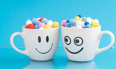 Couple of Happy Mug with smiley face. Happiness, smile, fresh and love Concept. Coffee for two.