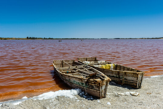 It's Sailman's boat over the pink water lake in Senegal, Africa