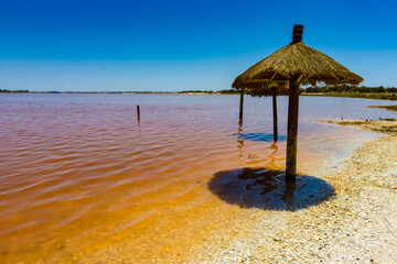 It's Senegal's pink water lake called Lake Retba or Lac Rose, north of the Cap Vert peninsula of Senegal, north east of Dakar