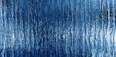 abstract background of blue color, corrugated glass