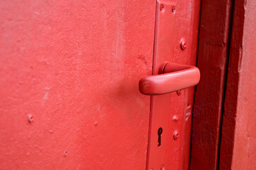 red door with red door handle