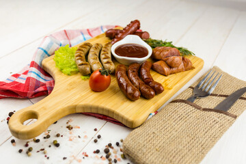 Grilled sausage with garlic and onions