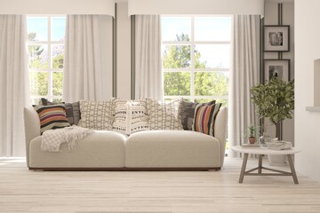 White stylish minimalist room with sofa and summer landscape in window. Scandinavian interior design. 3D illustration