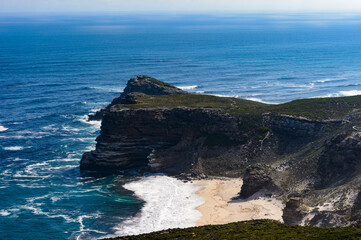 It's Cape of Good Hope, the southern tip of Africa, because it was once believed to be the dividing point between the Atlantic and Indian Oceans.
