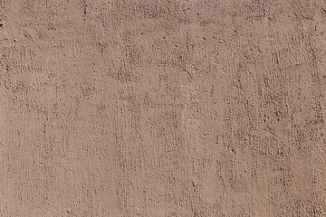 Abstract brown grunge high resolution background. The texture of the blotchy paint of a concrete...
