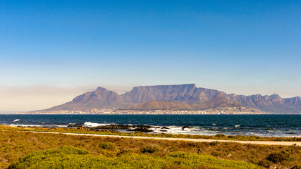 Obraz premium It's Table Mountain, touristic attraction, with many visitors using the cableway or hiking to the top. South Africa