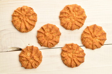 Fragrant tasty, sweet cereal cookies, close-up, on a white wooden table.