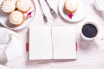 Fototapeta na wymiar Mockup porcelain plate with cake and opened recice book, notebook, book