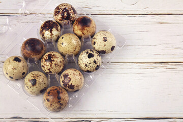 organic quail eggs in plastic box
