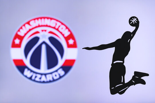 NEW YORK, USA, JUN 18, 2020: Washington Wizards basketball club logo, silhouette of jumping basket player, sport photo NBA, edit space.