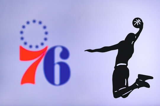 NEW YORK, USA, JUN 18, 2020: Philadelphia 76ers basketball club logo, silhouette of jumping basket player, sport photo NBA, edit space.