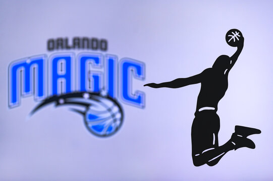 NEW YORK, USA, JUN 18, 2020: Orlando Magic basketball club logo, silhouette of jumping basket player, sport photo NBA, edit space.