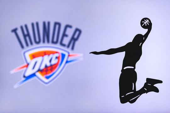 NEW YORK, USA, JUN 18, 2020: Oklahoma City Thunder basketball club logo, silhouette of jumping basket player, sport photo NBA, edit space.