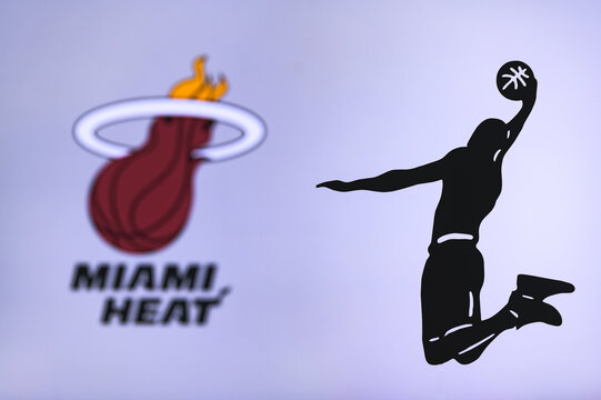 NEW YORK, USA, JUN 18, 2020: Miami Heat basketball club logo, silhouette of jumping basket player, sport photo NBA, edit space.