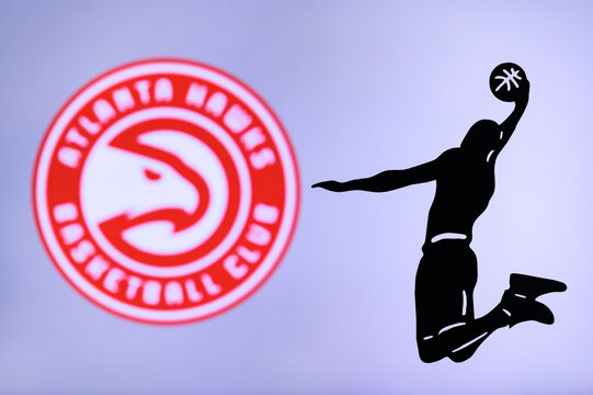 NEW YORK, USA, JUN 18, 2020: Atlanta Hawks basketball club logo, silhouette of jumping basket player, sport photo NBA, edit space.