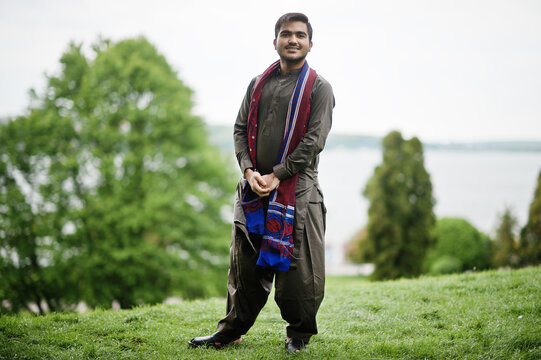 Indo pakistani man wear traditional clothes achkan or sherwani.