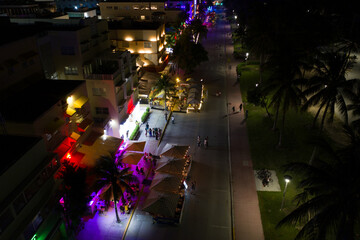 Aerial night photo tourists returning to Miami Beach during phase 1 reopening Coronavirus Covid 19 pandemic 2020