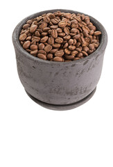 Roasted coffee beans in dark clay pot isolated on white background