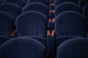 Gray soft velvet chairs in the theater concert hall