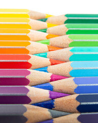 Colored pencils with tips arranged like a zipper. Macro still-file picture taken in studio with softbox.