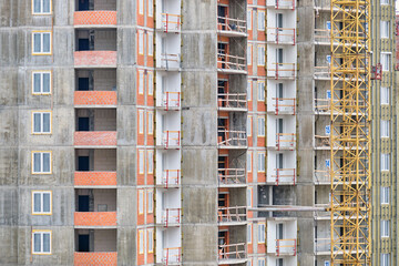 Construction of a residential building and cladding with insulation materials.