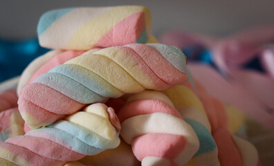 Different types of colorful marshmallows that decorate and give beauty to a party table.