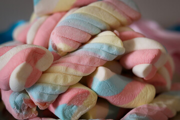 Different types of colorful marshmallows that decorate and give beauty to a party table.