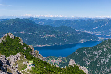 Fototapeta na wymiar The view of Lake Como during a spring hike in the Alps near the town of Lecco, Lombardy, Italy - May 2020