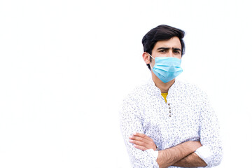 young doctor with mask isolated on a white background with space for text.