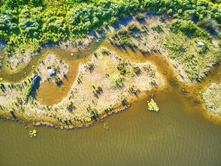 Scenic aerial view of the Atlantic ocean coast and estuary of Ruisseau de cires in Saint-Brice,...